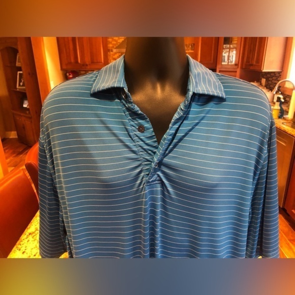 FootJoy men’s golf polo. EUC. Sharp blue w/white stripes & logo‎ on back…